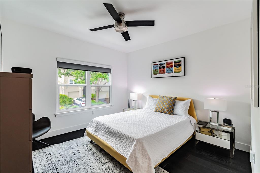 1119 Normandy Trace Road Tampa, FL 33602 - Photo 27 of 55 Primary Bedroom with gorgeous white oak floors stained matte black.