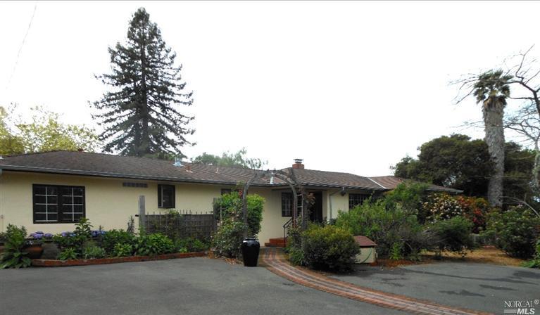8797 Barnett Valley Road Sebastopol, CA 95472 - Photo 1 of 1 a front view of a house with garden