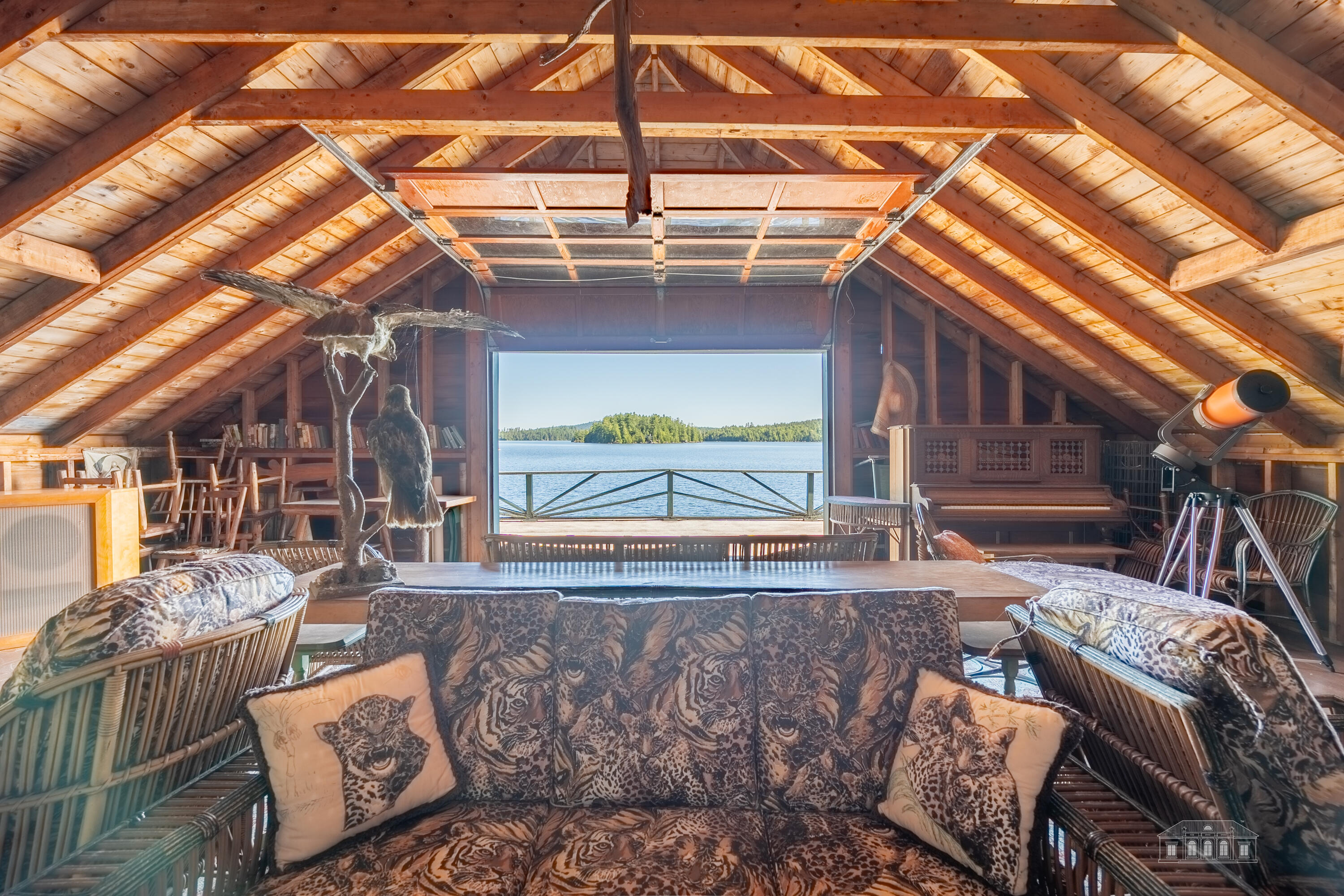 144 County Road Tupper Lake, NY 12986 - Photo 72 of 76 Big Boathouse The second floor opens to the flat roof below and gives a view of the bay.