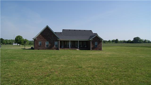 363 West Hester Road Cottontown, TN 37048 - Photo 2 of 14 a view of a big house with a big yard and large trees