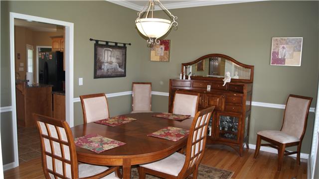 363 West Hester Road Cottontown, TN 37048 - Photo 10 of 14 a view of a dining room with furniture and wooden floor