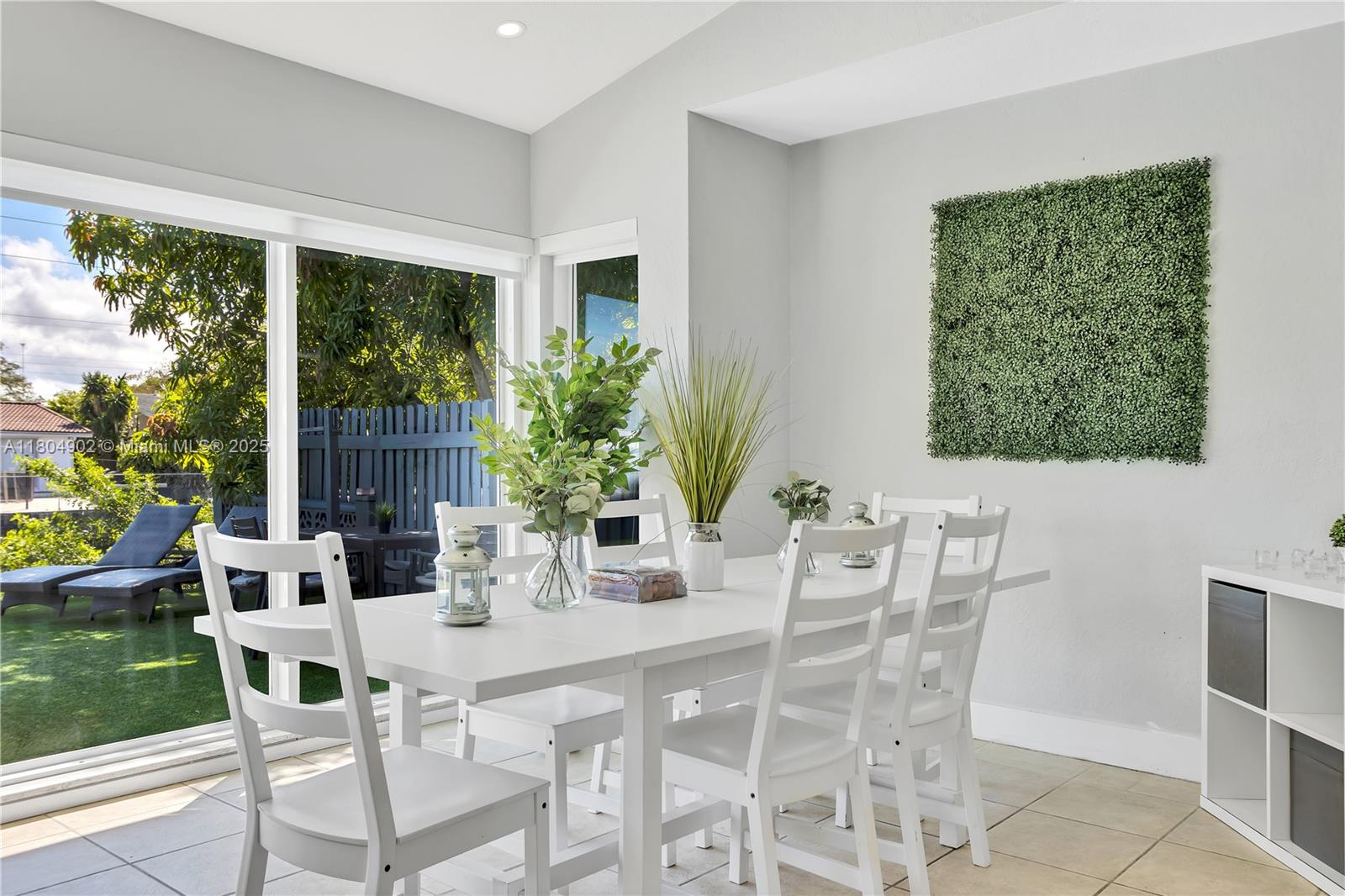 2828 Cleveland Street Hollywood, FL 33020 - Photo 3 of 23 a dining room with furniture window and wooden floor