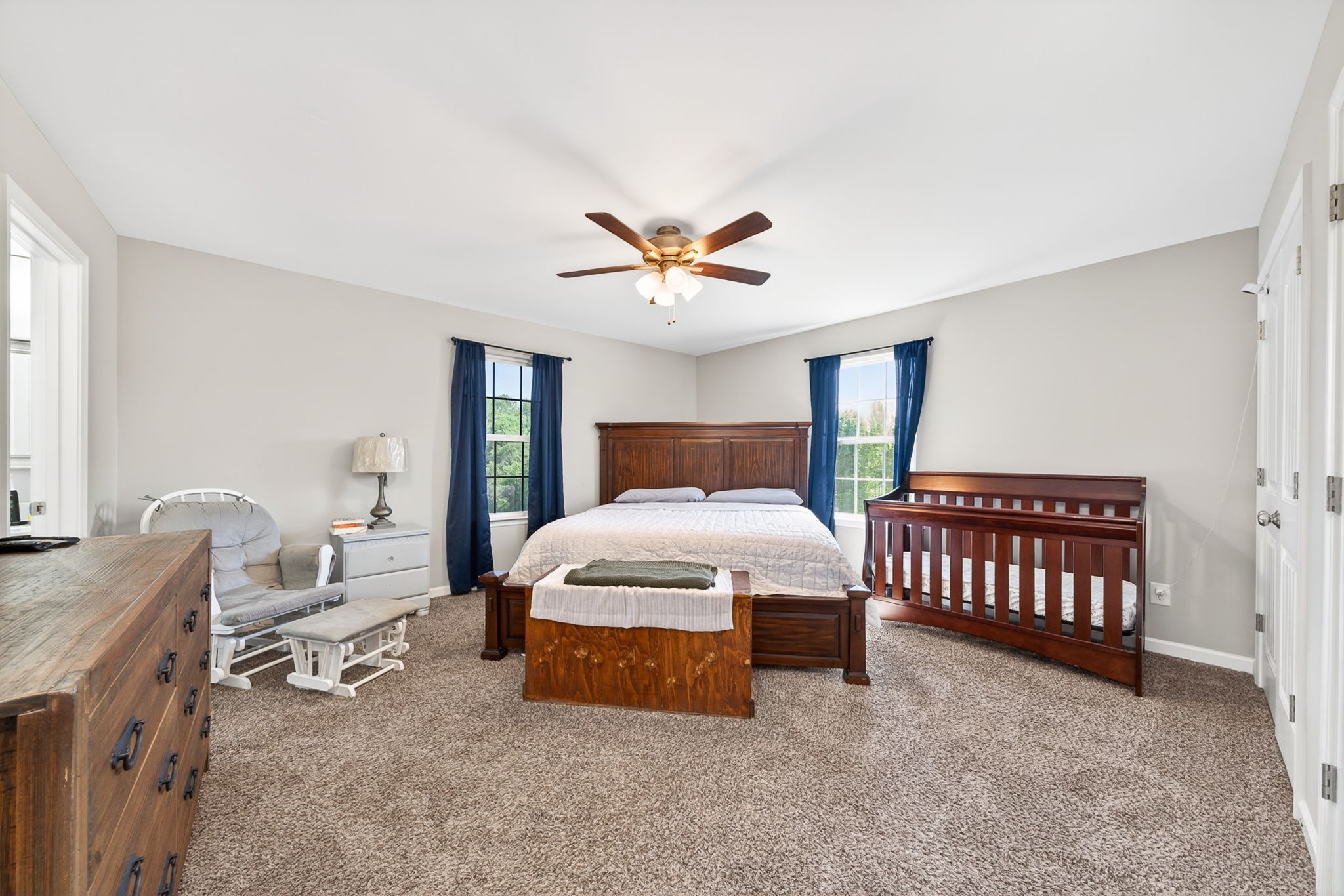 144 Liberty Road Sparta, TN 38583 - Photo 7 of 24 a spacious bedroom with a bed and a table