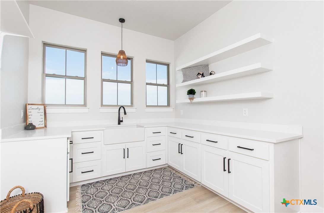 8152 Evenfall Lane Temple, TX 76501 - Photo 13 of 33 a bathroom with a sink and a mirror