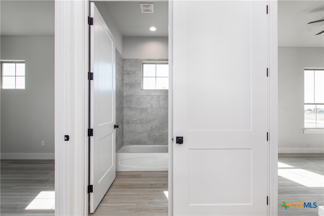 8152 Evenfall Lane Temple, TX 76501 - Photo 28 of 33 a bathroom with a bathtub and shower