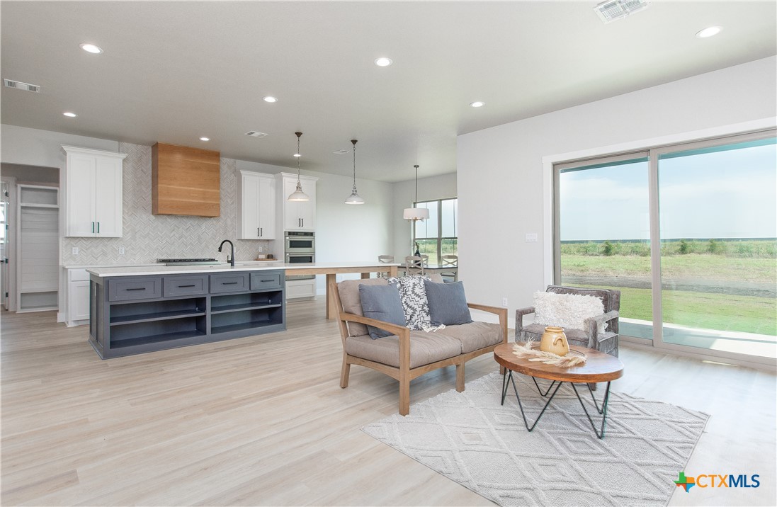 8152 Evenfall Lane Temple, TX 76501 - Photo 4 of 33 a living room with furniture and a large window
