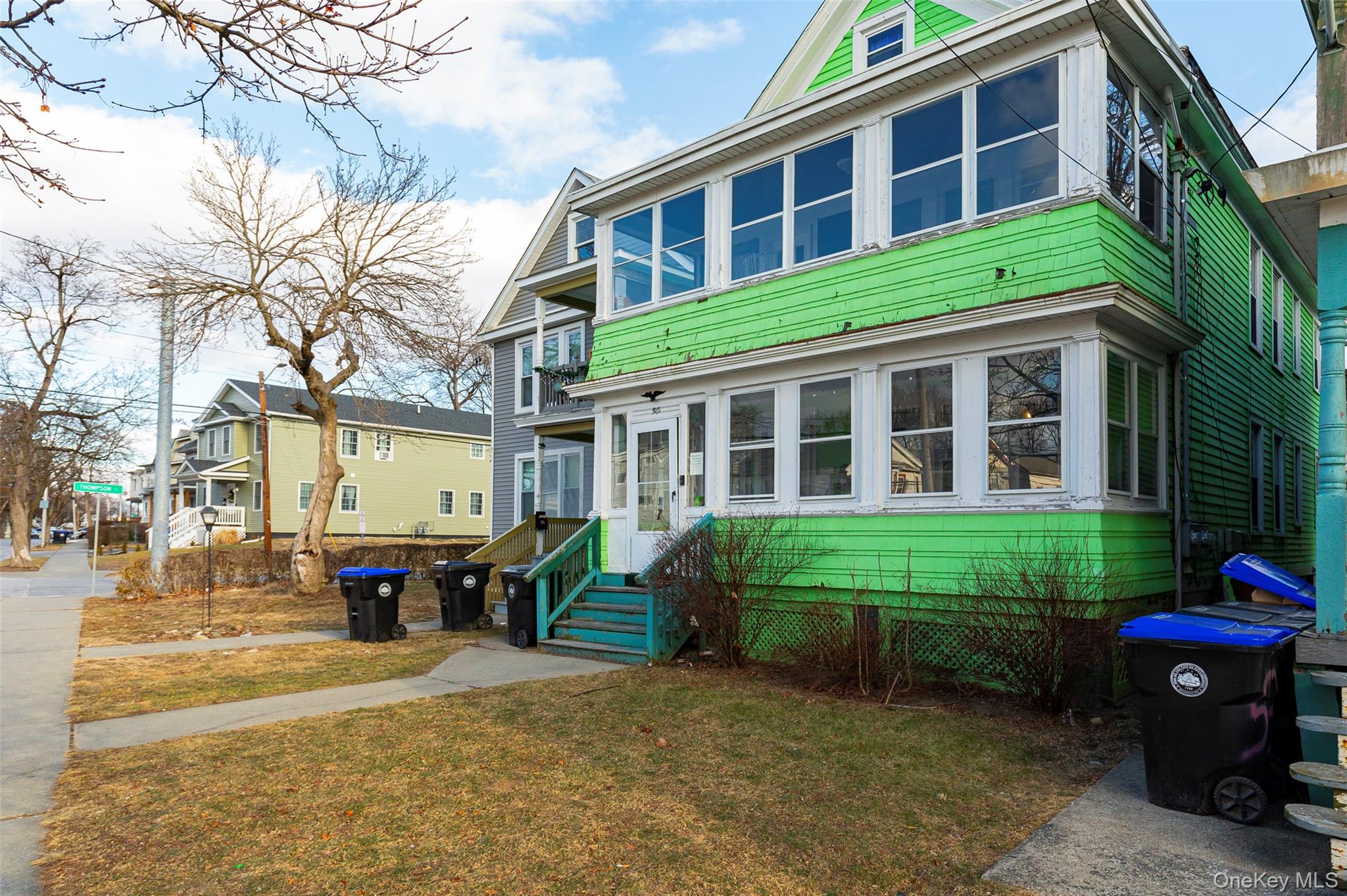 55 Smith Street Poughkeepsie, NY 12601 - Photo 3 of 6 a view of brick building with a yard