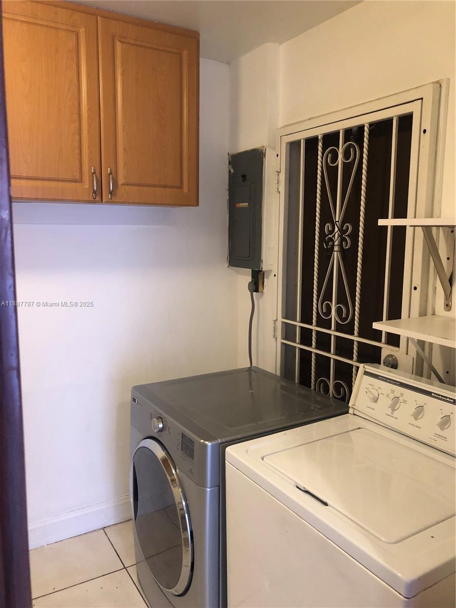 19319 Northwest 54th Court Miami Gardens, FL 33055 - Photo 11 of 20 a utility room with dryer and washer