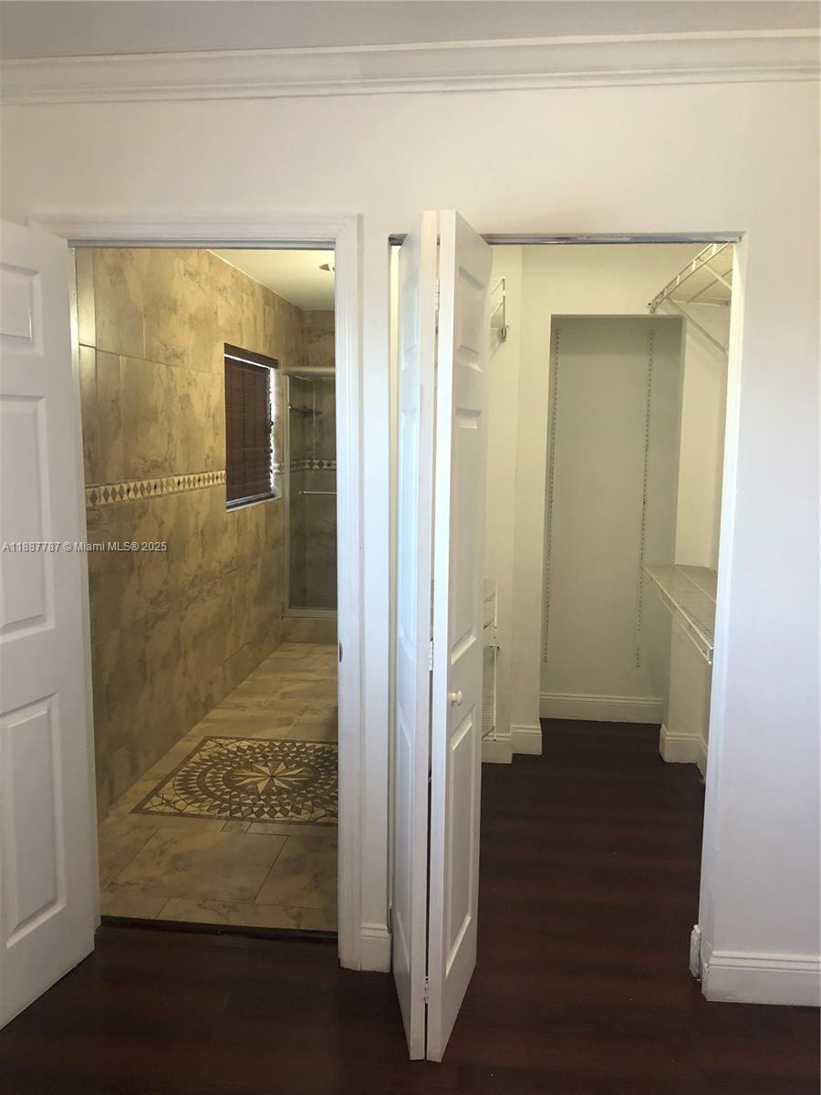 19319 Northwest 54th Court Miami Gardens, FL 33055 - Photo 14 of 20 a view of a bathroom from a hallway