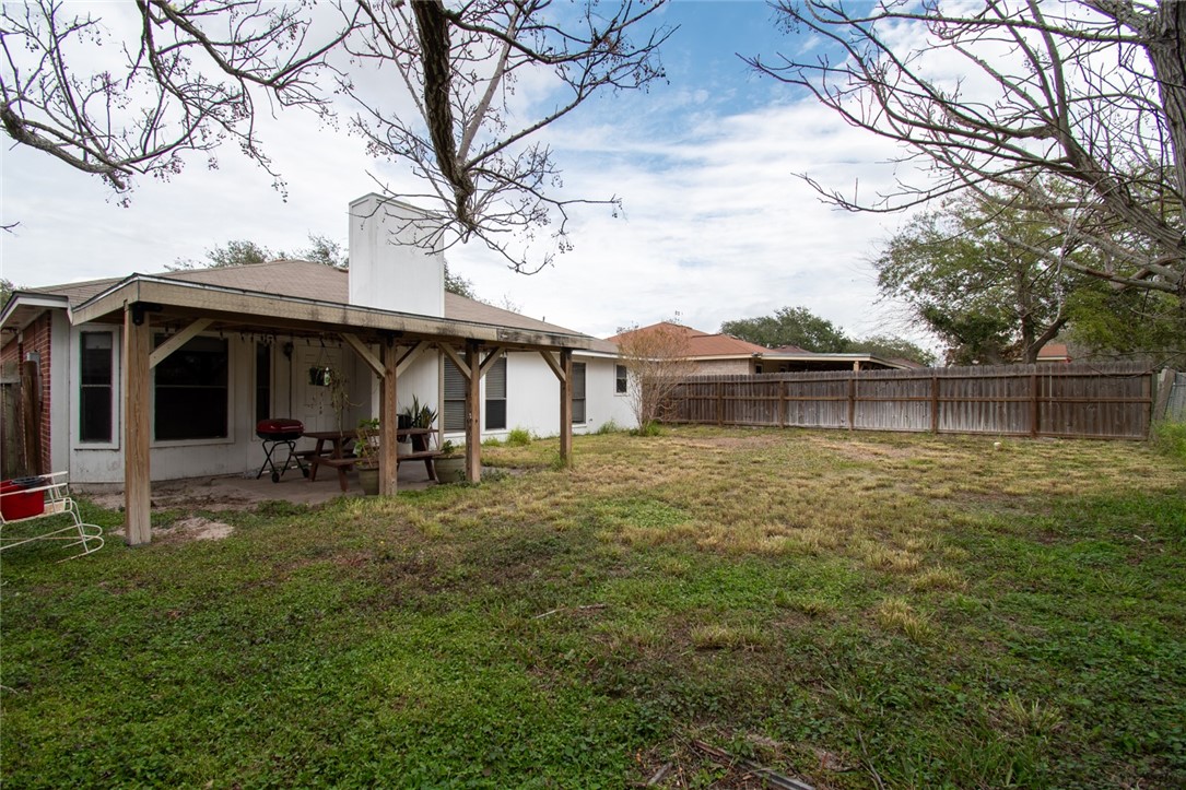 2185 Spring Park Drive Ingleside, TX 78362 - Photo 32 of 32 a front view of house with yard and seating area