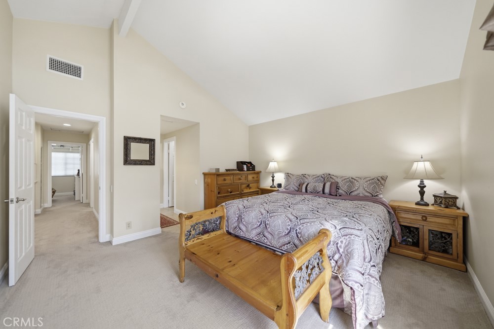 5 Eden Irvine, CA 92620 - Photo 24 of 42 a bed room with a bed and a lamp