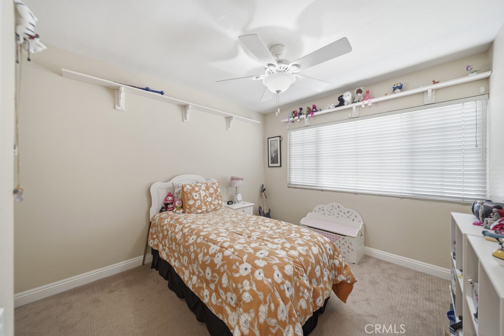 5 Eden Irvine, CA 92620 - Photo 26 of 42 a bedroom with a bed and a window