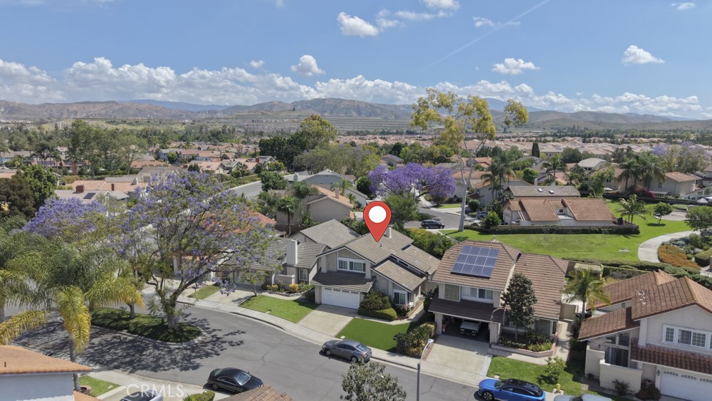 5 Eden Irvine, CA 92620 - Photo 3 of 42 an aerial view of a house with a garden