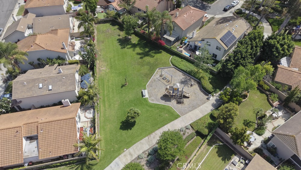 5 Eden Irvine, CA 92620 - Photo 37 of 42 an aerial view of a house with a garden and swimming pool
