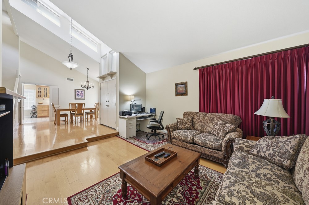 5 Eden Irvine, CA 92620 - Photo 9 of 42 a living room with furniture and a table