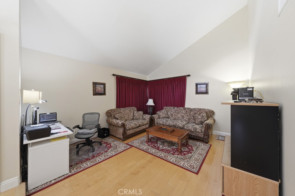 5 Eden Irvine, CA 92620 - Photo 10 of 42 a living room with furniture and a window