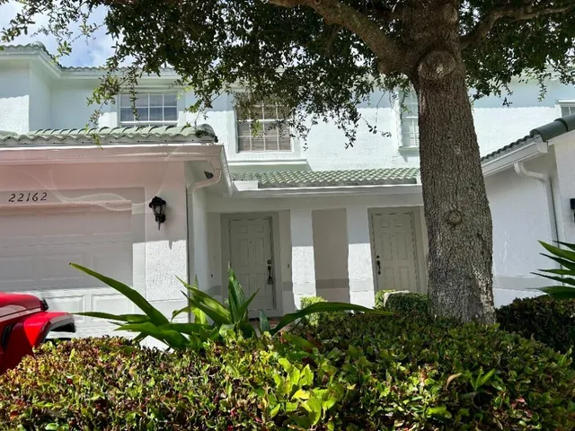 a bathroom with a mirror and a shower