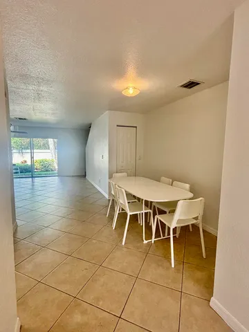 a bathroom with a sink a mirror and vanity
