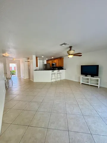 a view of a livingroom with furniture and window