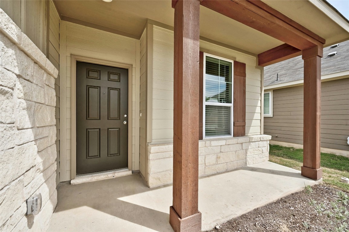 529 Tree Nut Loop Buda, TX 78610 - Photo 2 of 37 a view of an entryway of house