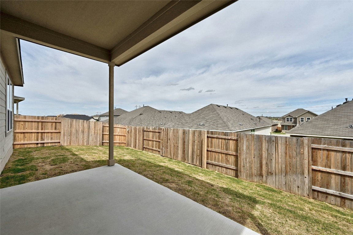 529 Tree Nut Loop Buda, TX 78610 - Photo 23 of 37 a balcony with a yard