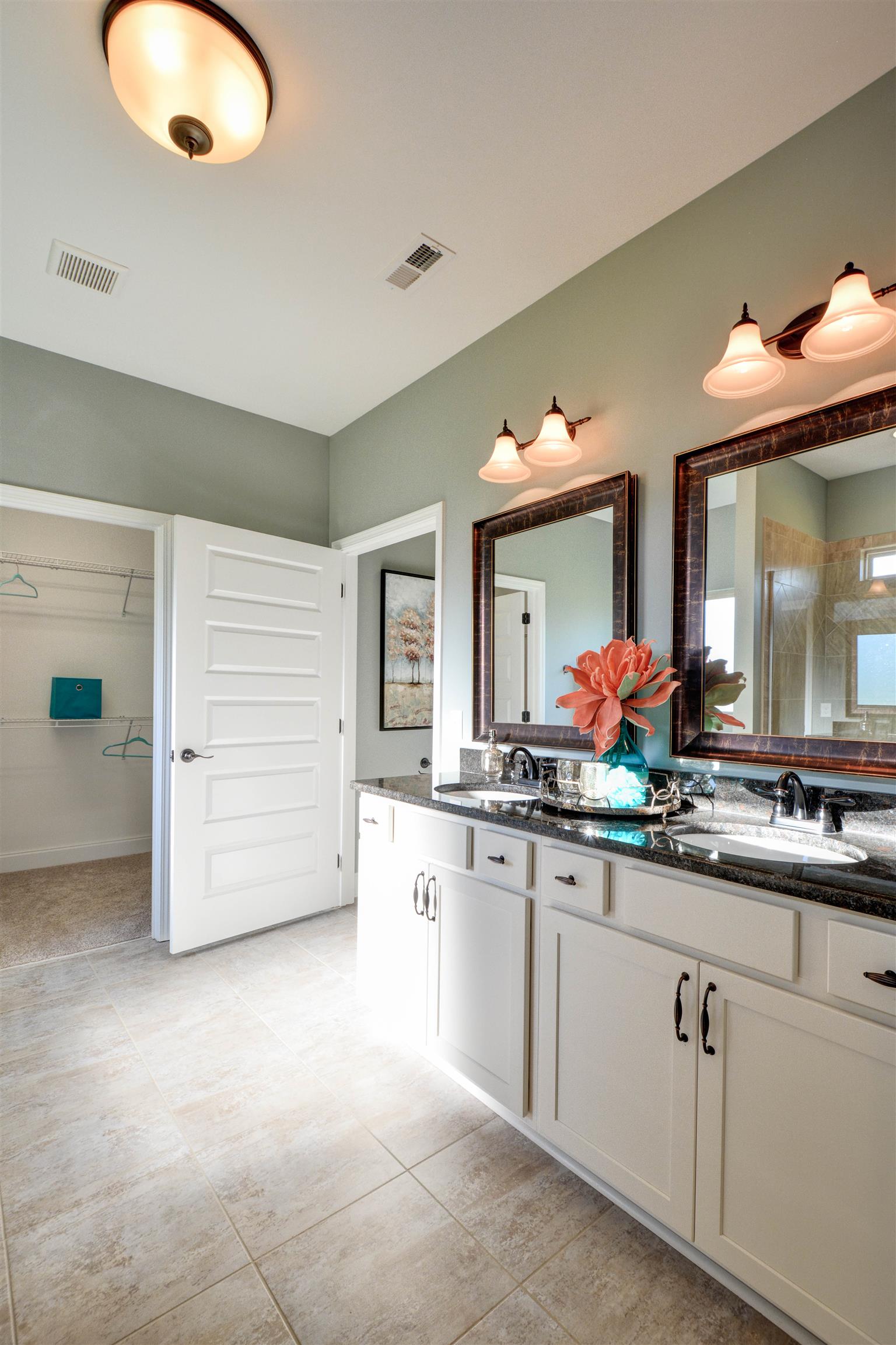 360 Quarry Road Gallatin, TN 37066 - Photo 18 of 29 The master suite is located on the main level and includes a large walk-in closet, double vanities, and separate tub and shower. *Photos are of a model home. Actual finishes may vary.*