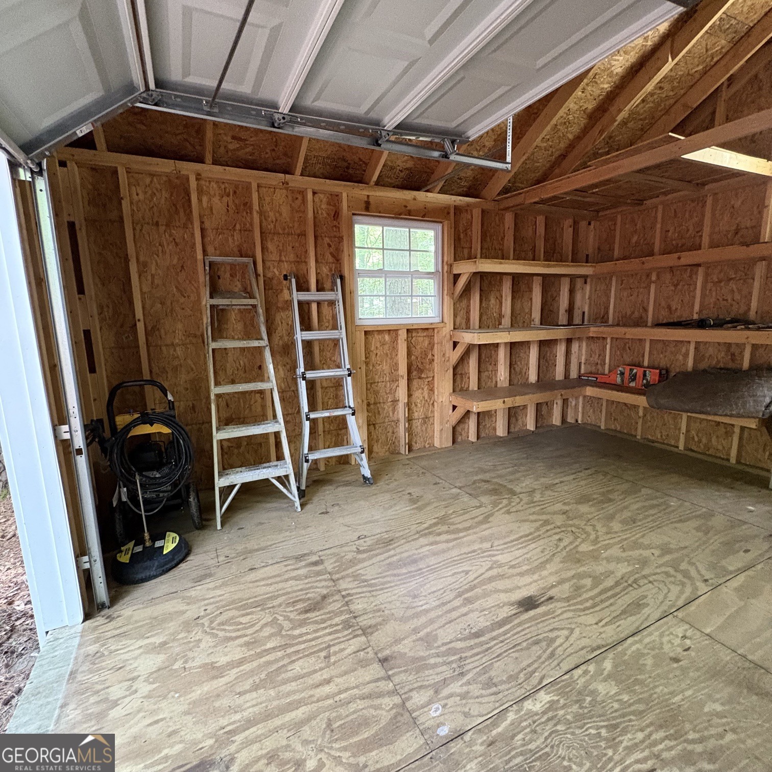 190 Rockington Drive Tyrone, GA 30290 - Photo 15 of 54 a view of a room with wooden walls and windows