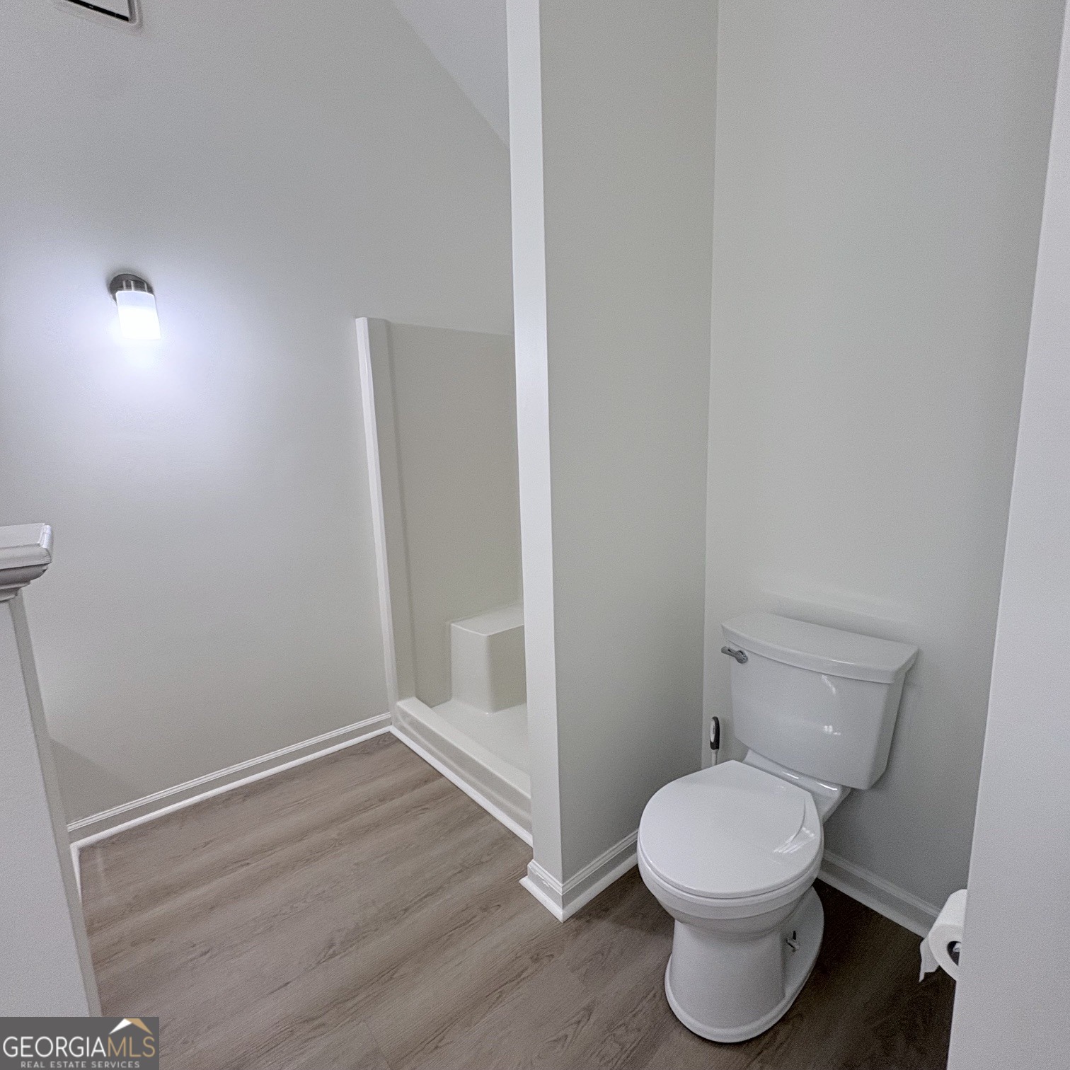 190 Rockington Drive Tyrone, GA 30290 - Photo 44 of 54 a white toilet sitting next to a shower