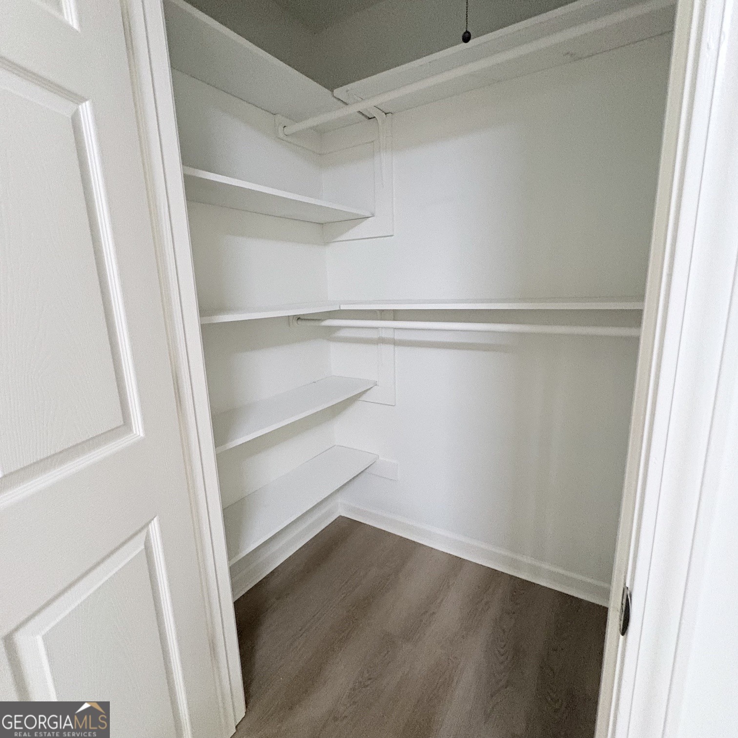 190 Rockington Drive Tyrone, GA 30290 - Photo 49 of 54 a view of walk in closet with empty racks