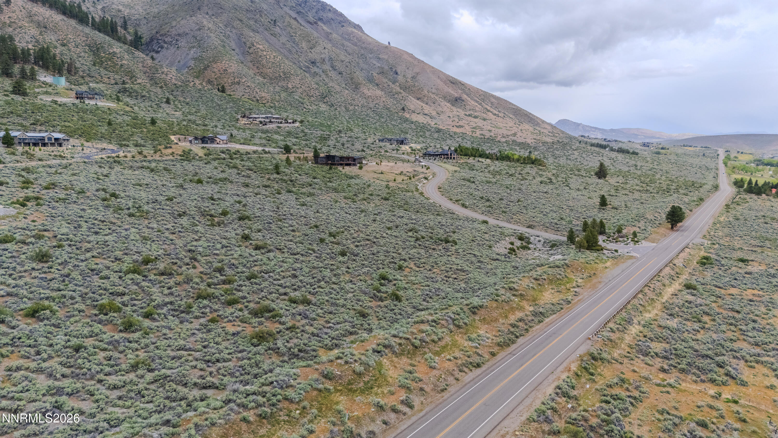 301 Adams Ranch Road Genoa, NV 89411 - Photo 7 of 25 a view of a dry yard with wooden fence