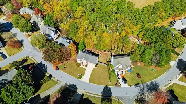 an aerial view of residential house with outdoor space