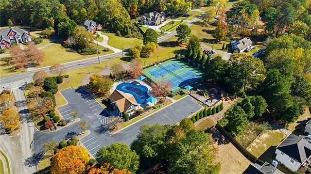 an aerial view of residential house with outdoor space