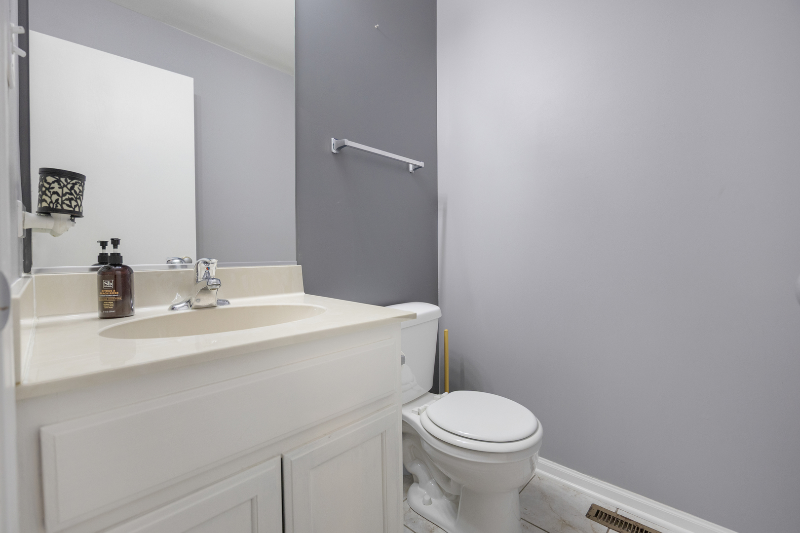 1014 Edinburgh Court Joliet, IL 60431 - Photo 10 of 25 a bathroom with a sink a toilet and mirror