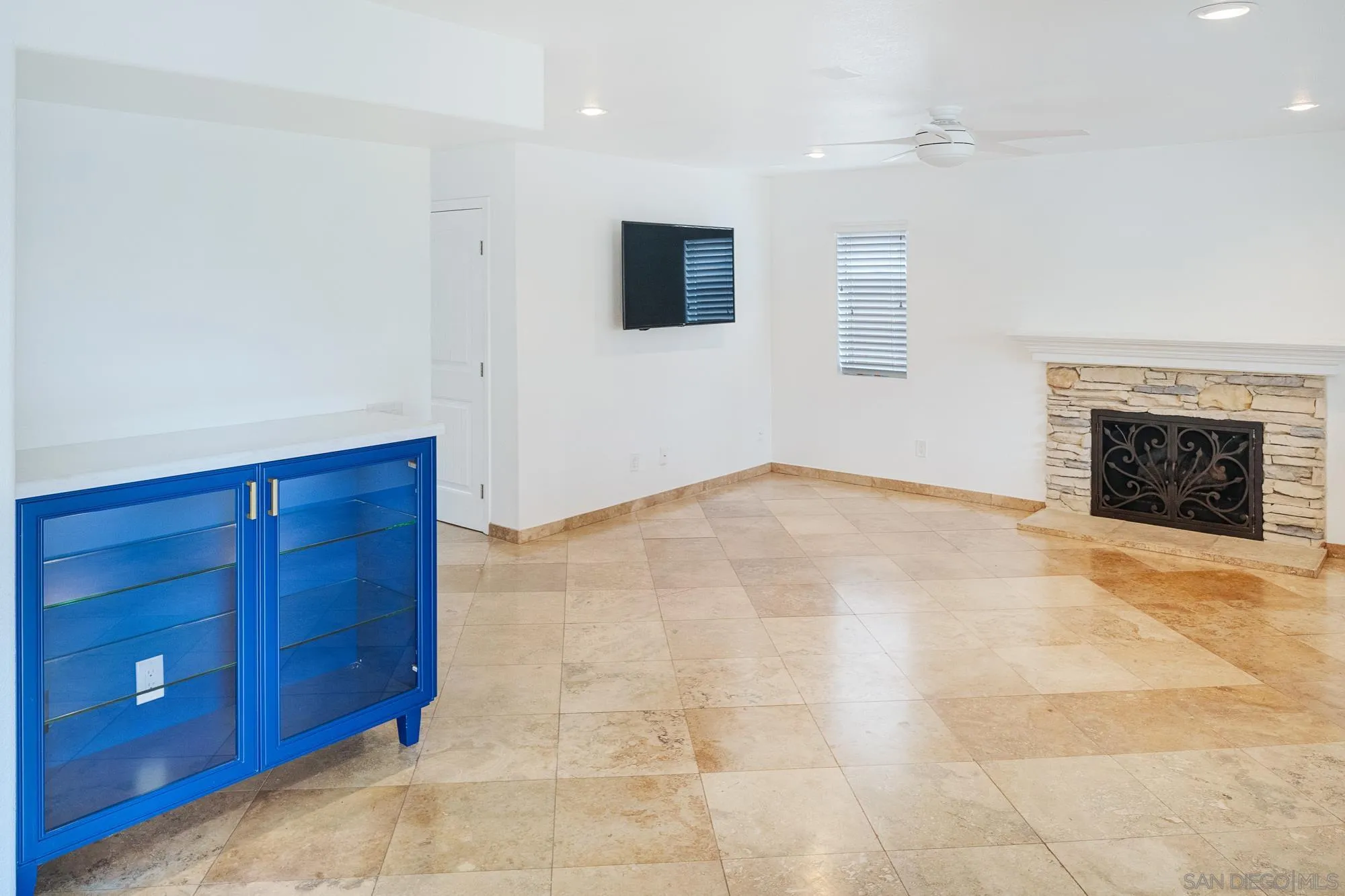 4318 Meadow Spring Way Oceanside, CA 92057 - Photo 17 of 50 a view of an empty room with a fireplace