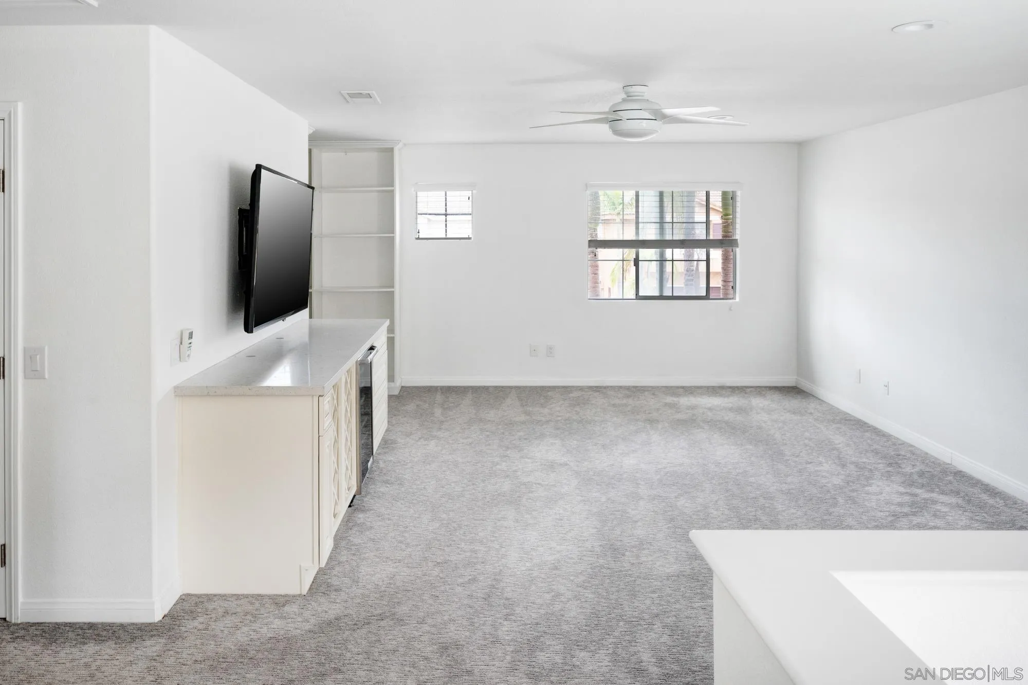 4318 Meadow Spring Way Oceanside, CA 92057 - Photo 19 of 50 a view of a living room with a flat screen tv