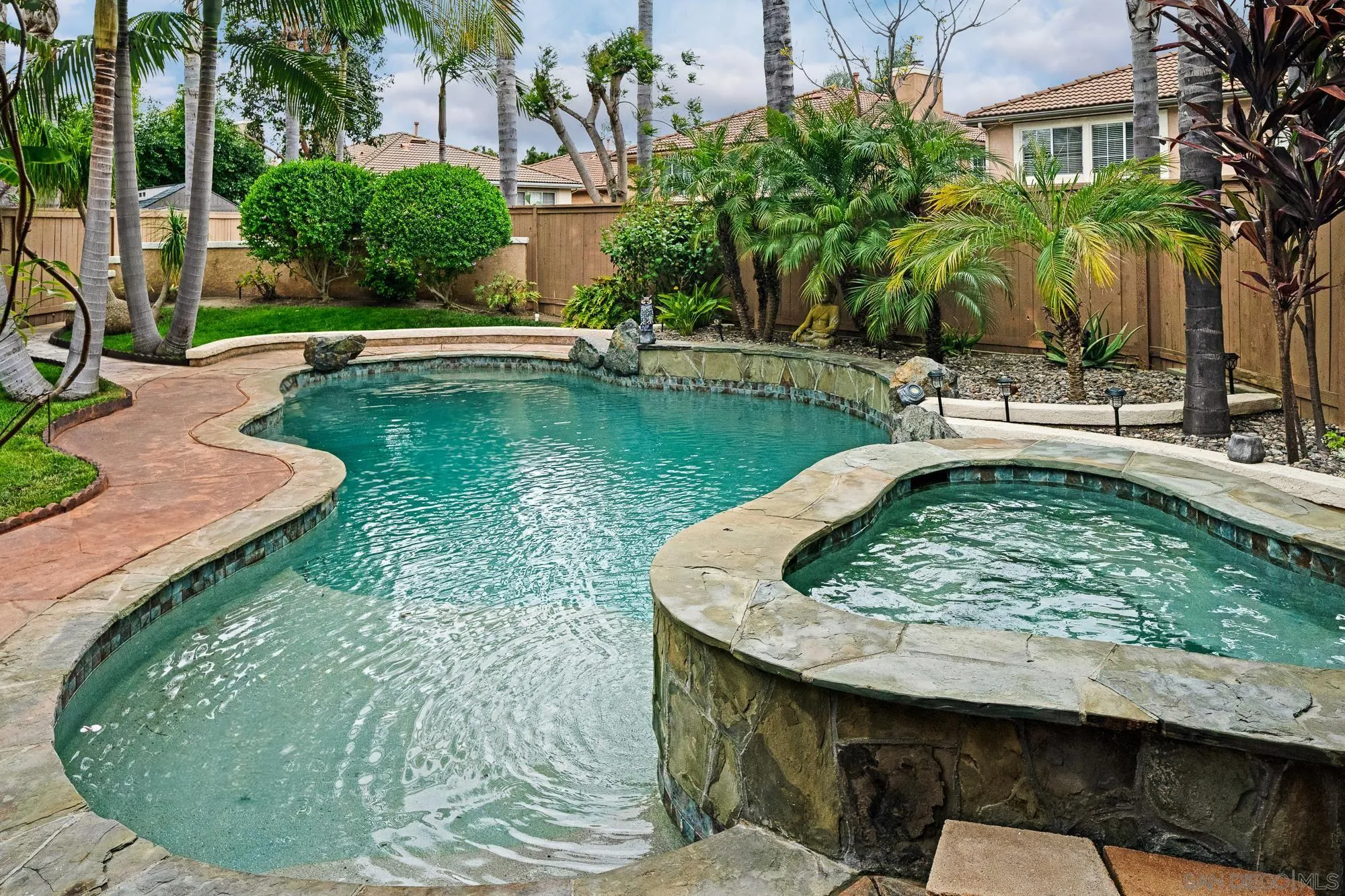 4318 Meadow Spring Way Oceanside, CA 92057 - Photo 2 of 50 a view of a backyard with swimming pool