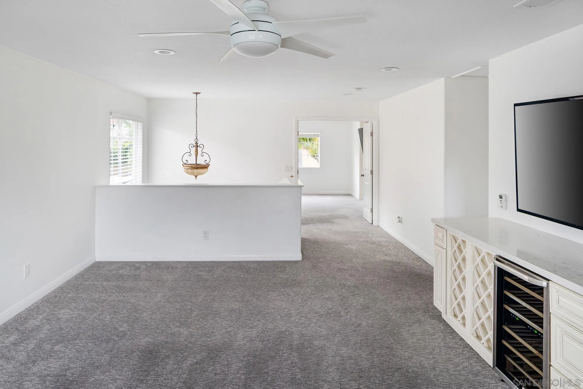 4318 Meadow Spring Way Oceanside, CA 92057 - Photo 23 of 50 a view of a kitchen with a sink and a refrigerator