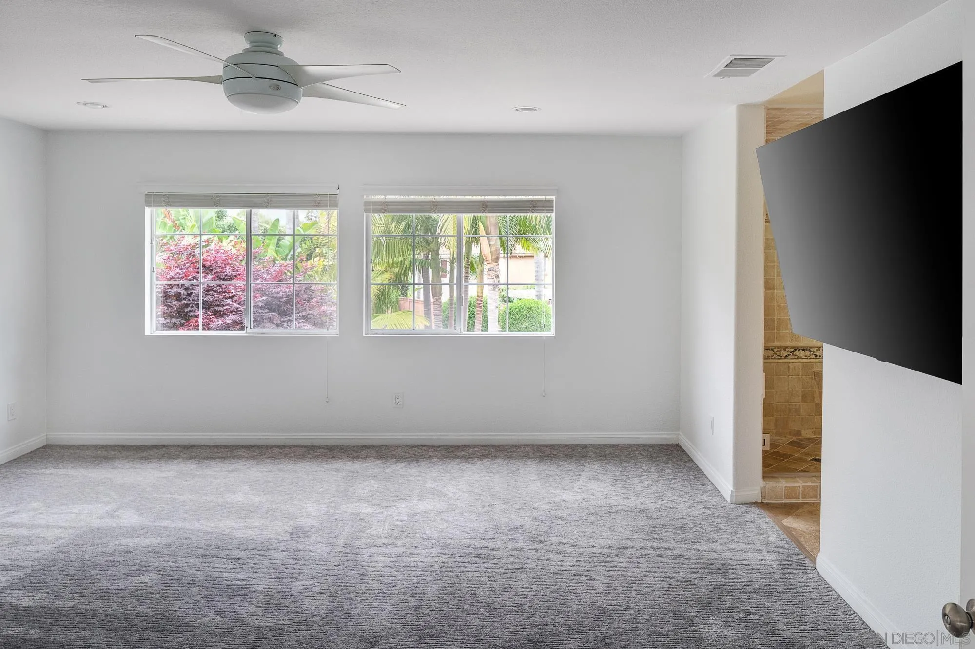 4318 Meadow Spring Way Oceanside, CA 92057 - Photo 24 of 50 an empty room with windows
