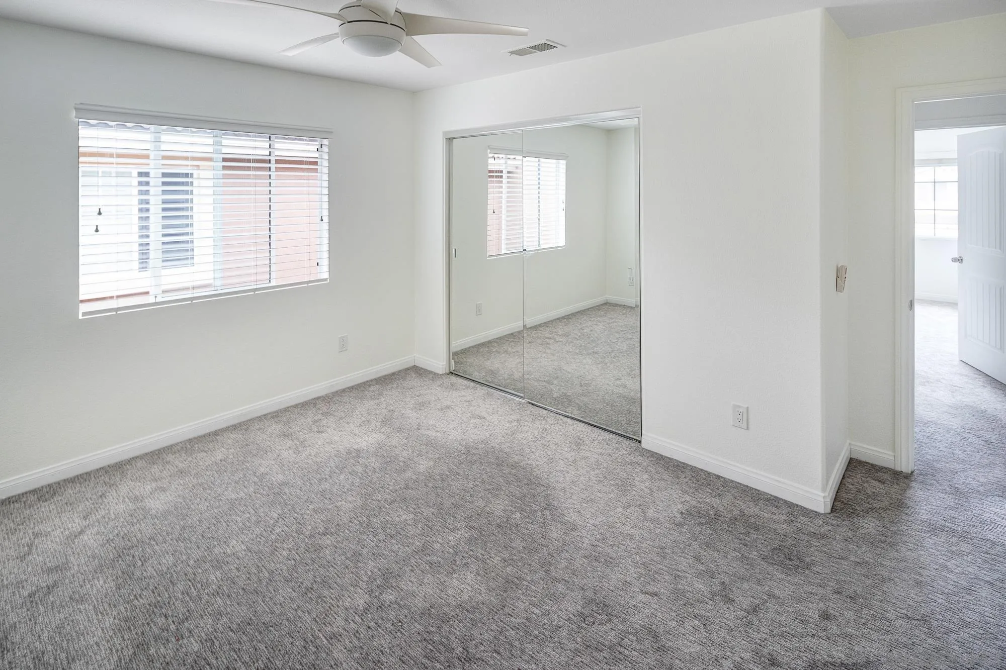 4318 Meadow Spring Way Oceanside, CA 92057 - Photo 36 of 50 a view of an empty room with a window