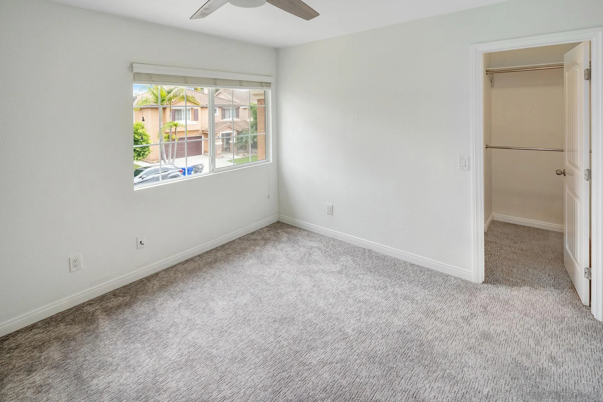 4318 Meadow Spring Way Oceanside, CA 92057 - Photo 40 of 50 an empty room with a window