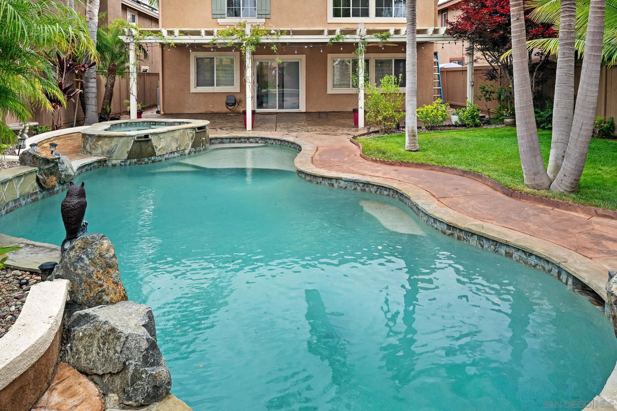 4318 Meadow Spring Way Oceanside, CA 92057 - Photo 44 of 50 a view of a house with backyard porch and sitting area