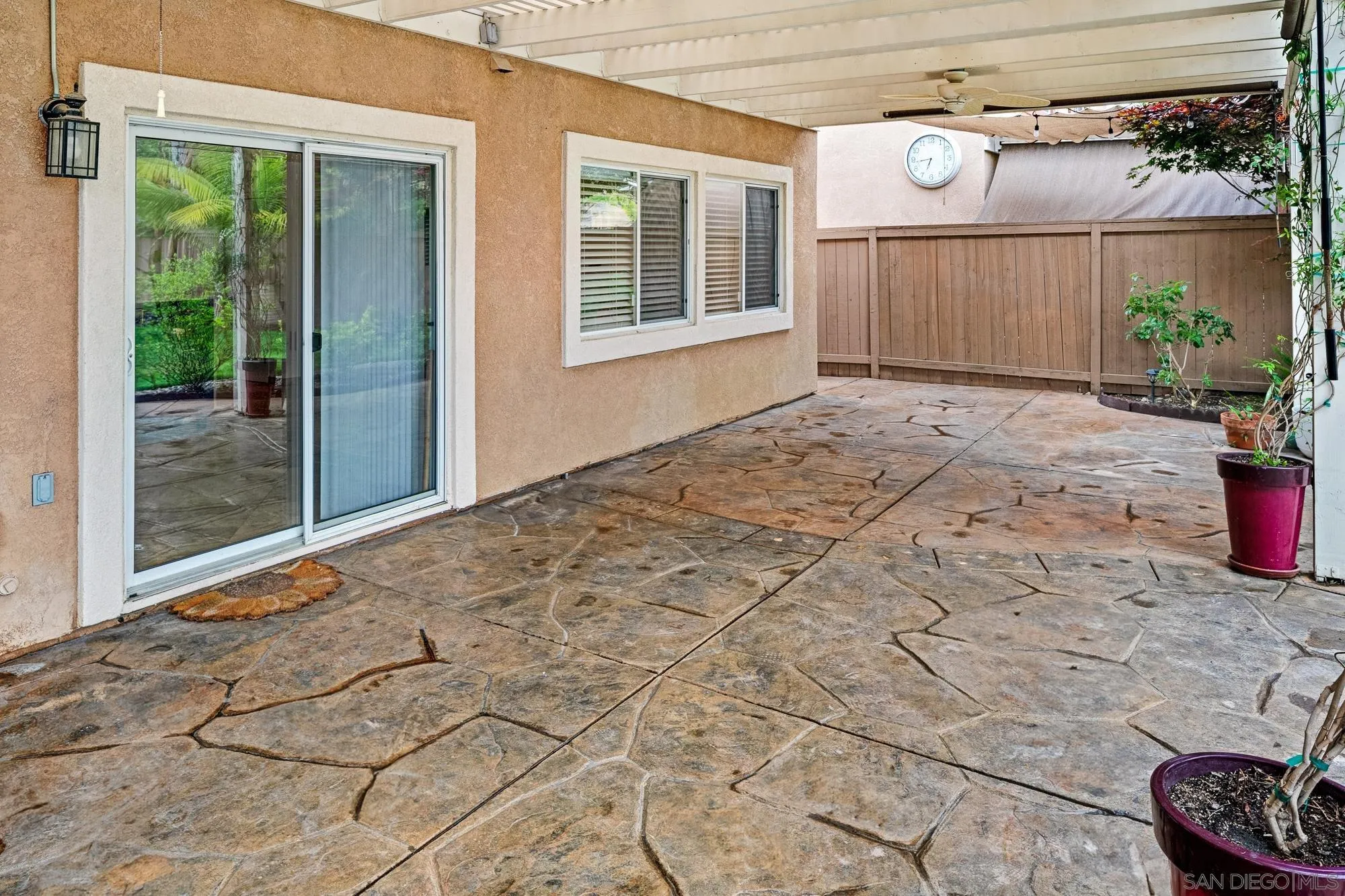 4318 Meadow Spring Way Oceanside, CA 92057 - Photo 47 of 50 a view of a backyard of a house with plants