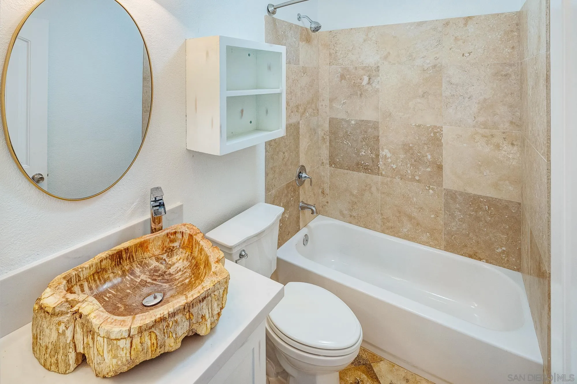 4318 Meadow Spring Way Oceanside, CA 92057 - Photo 10 of 50 a bathroom with a toilet sink and bathtub