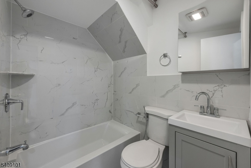 17 Mission Street Montclair, NJ 07042 - Photo 11 of 35 a bathroom with a sink toilet and bathtub