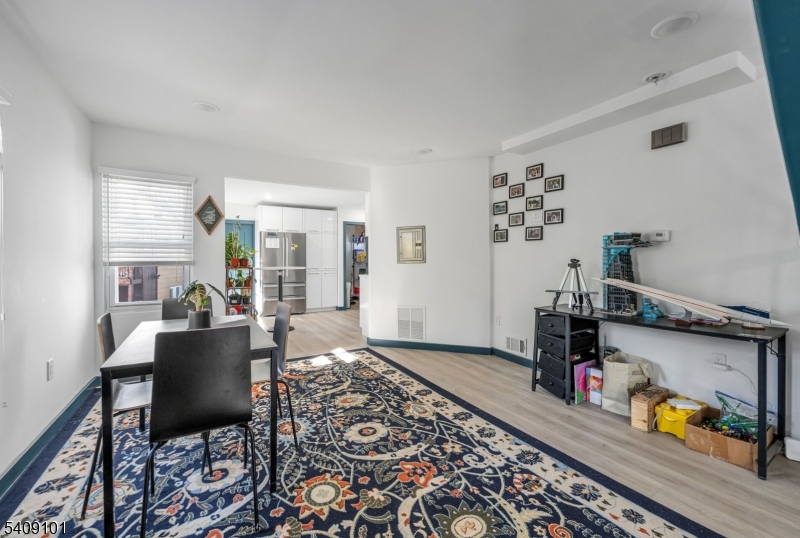17 Mission Street Montclair, NJ 07042 - Photo 19 of 35 a living room with furniture and a wooden floor