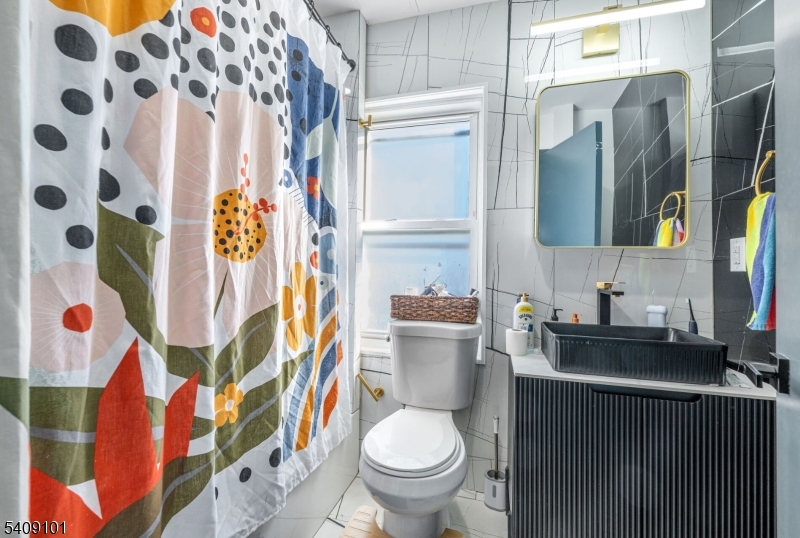 17 Mission Street Montclair, NJ 07042 - Photo 24 of 35 a bathroom with a toilet and a sink