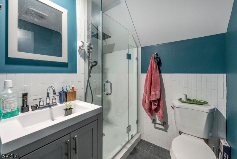 17 Mission Street Montclair, NJ 07042 - Photo 25 of 35 a bathroom with a sink toilet and shower