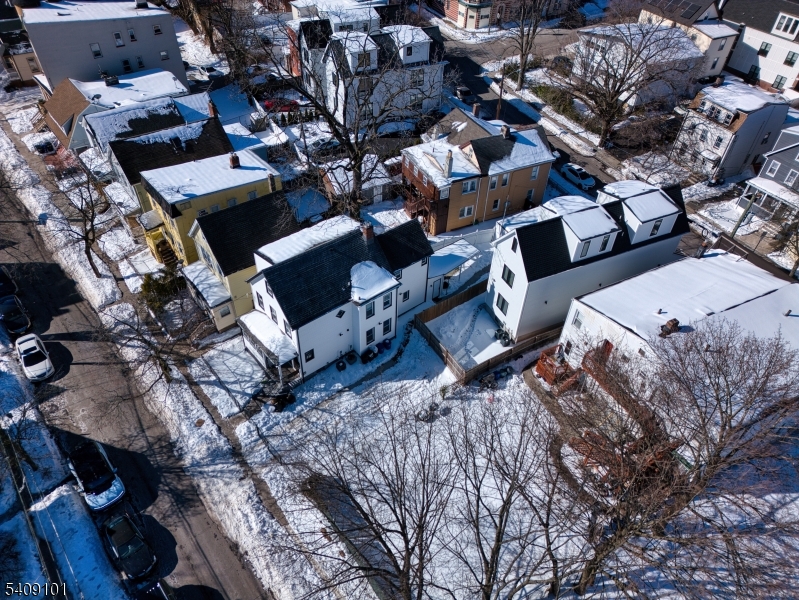 17 Mission Street Montclair, NJ 07042 - Photo 33 of 35 an aerial view of a house with a yard