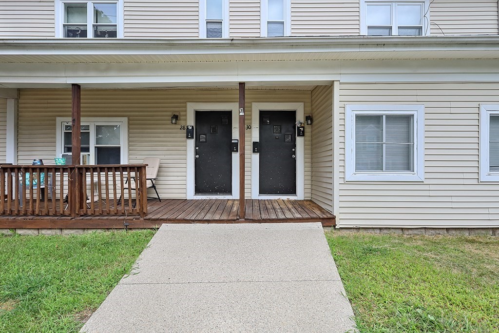 28-30 Alpine Place Franklin, MA 02038 - Photo 2 of 21 a front view of a house with a yard