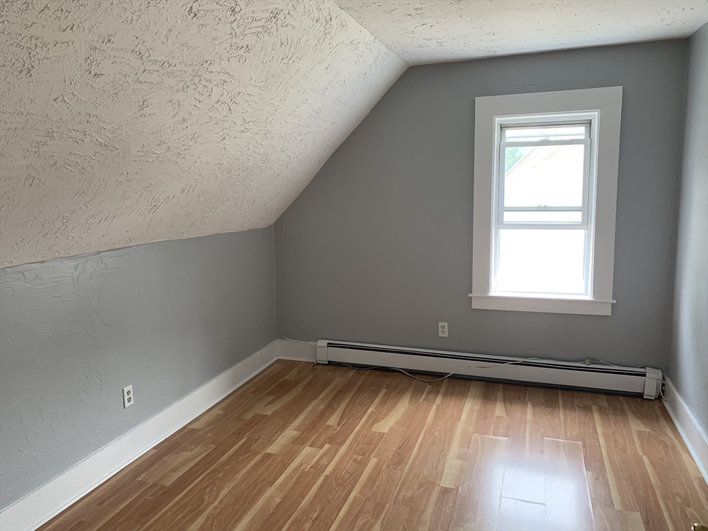 28-30 Alpine Place Franklin, MA 02038 - Photo 10 of 21 a view of an empty room and window